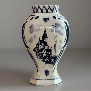 hand painted Delftware vase, marked "Delft Blou" on the bottom.